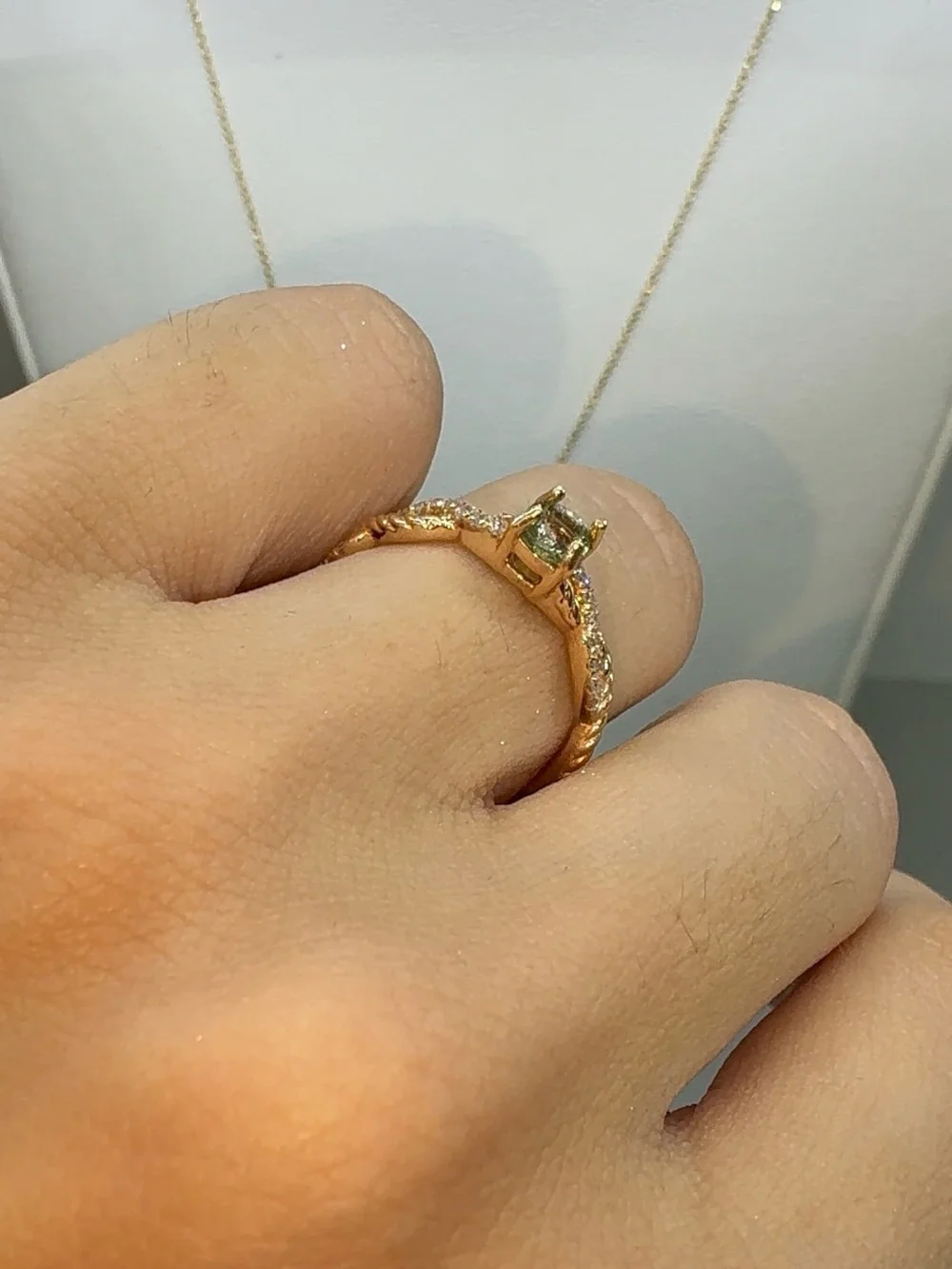 14KT ROSE GOLD DIAMOND AND PERIDOT RING